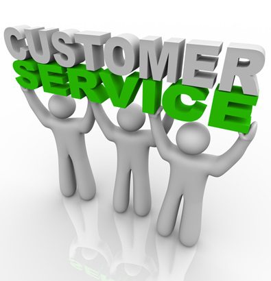 Three customer service representatives lift the words