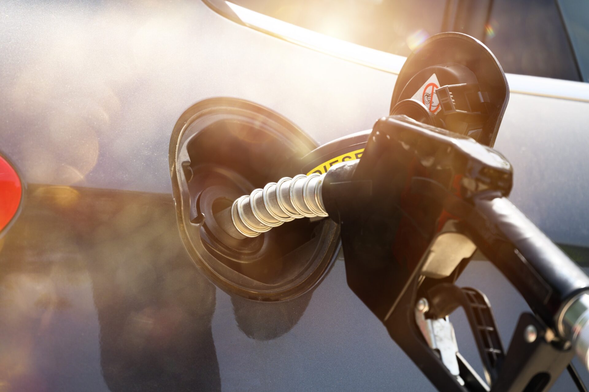 Fuel pump fill a tank of a car in a station